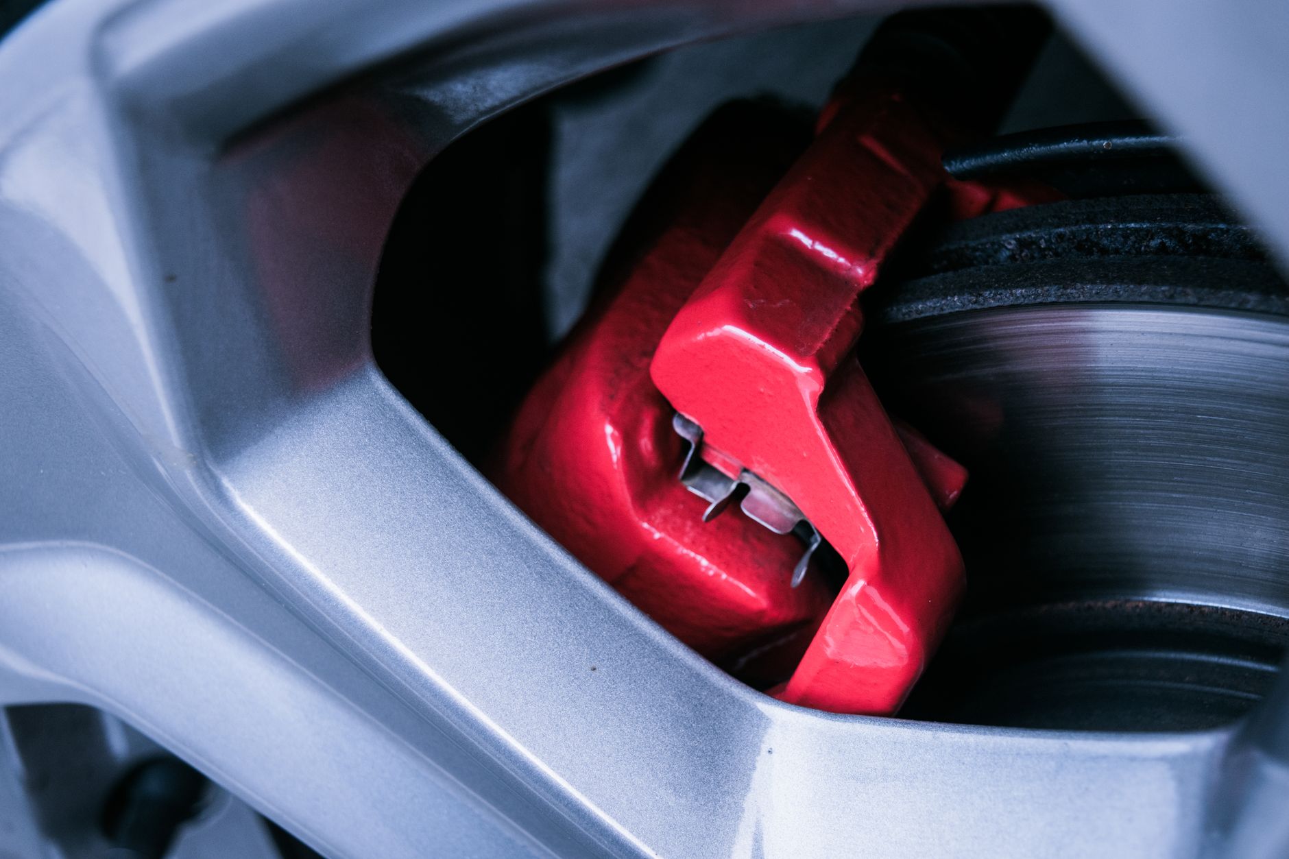 A new brake disc with a red caliper